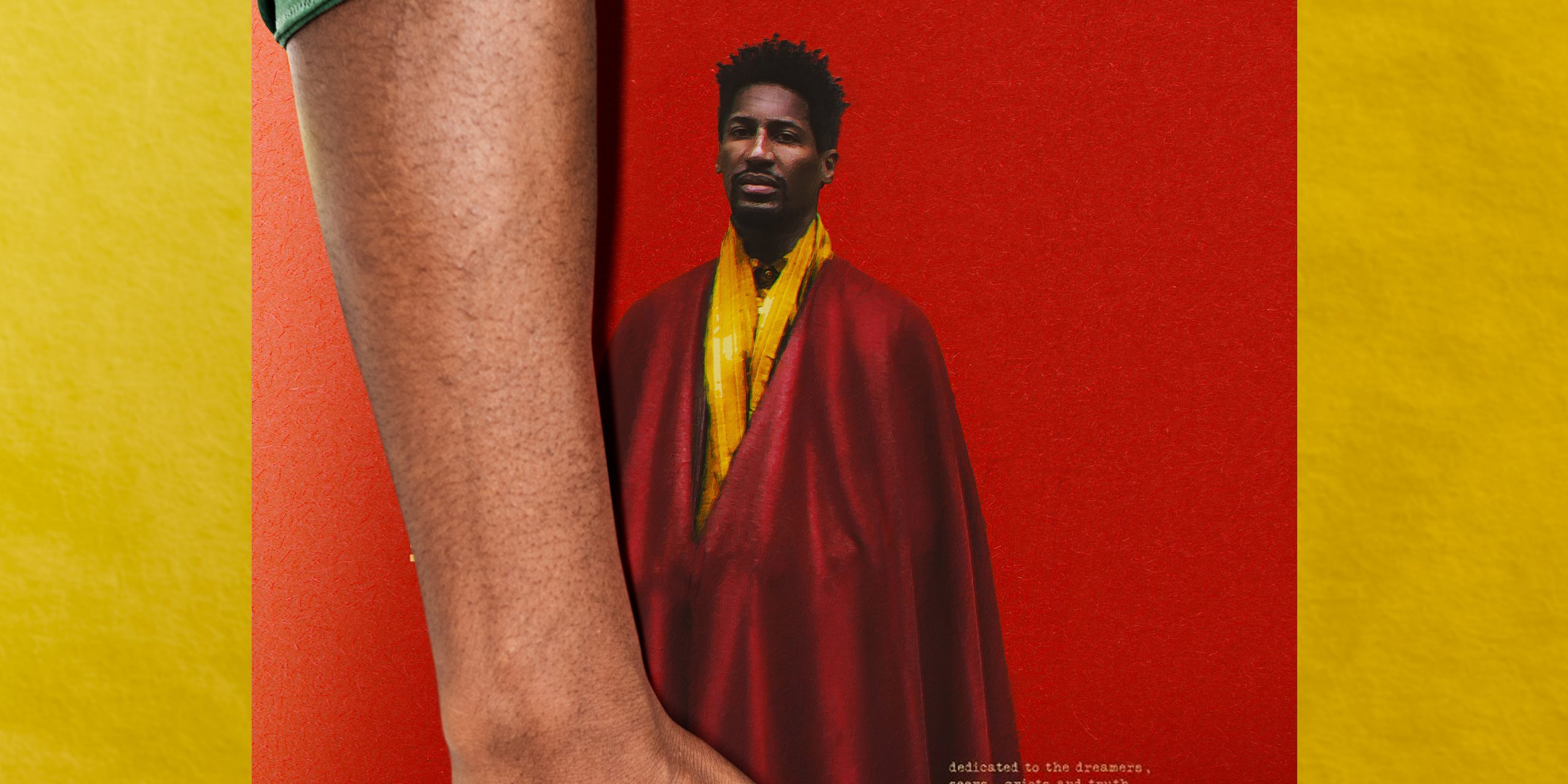 African Man Holding Record Concept Jon Batiste y FREEDOM